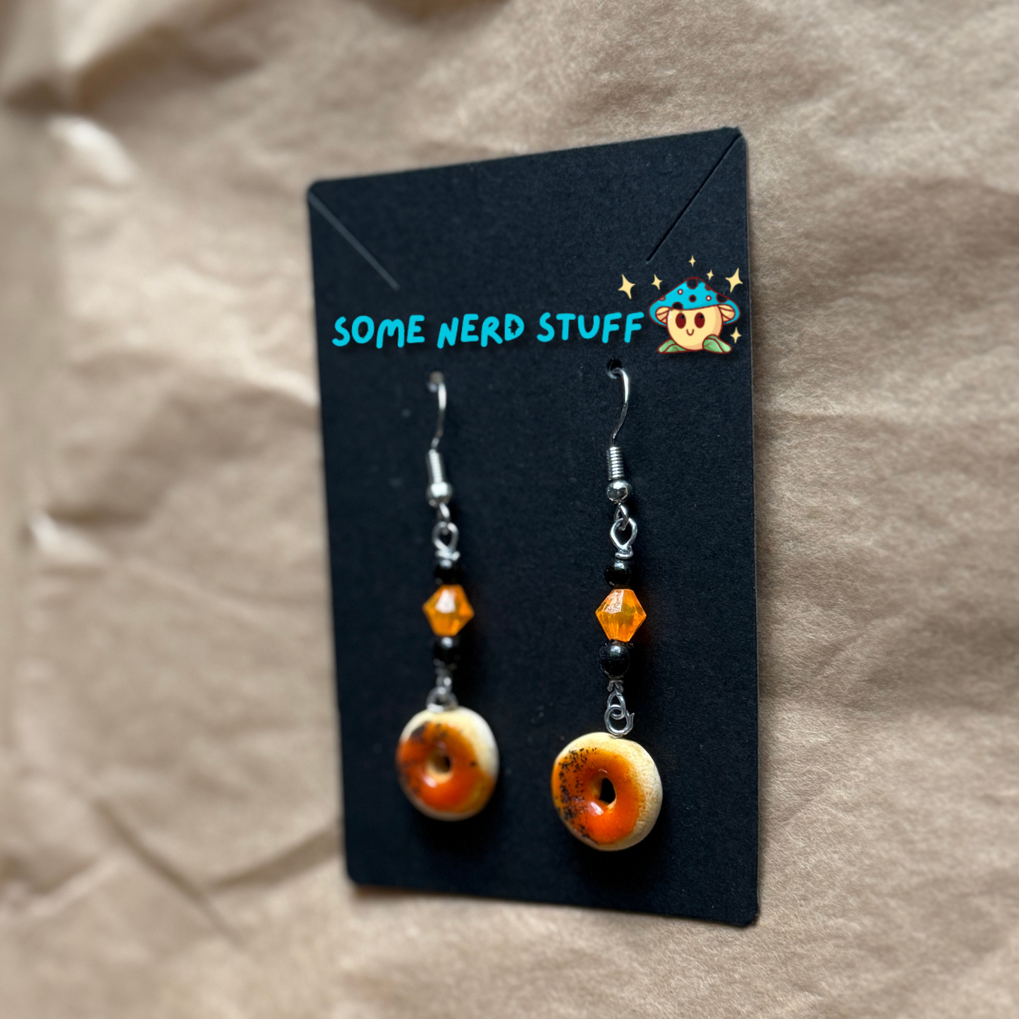 Blood Orange Polymer Clay glazed earring topped with beads size view