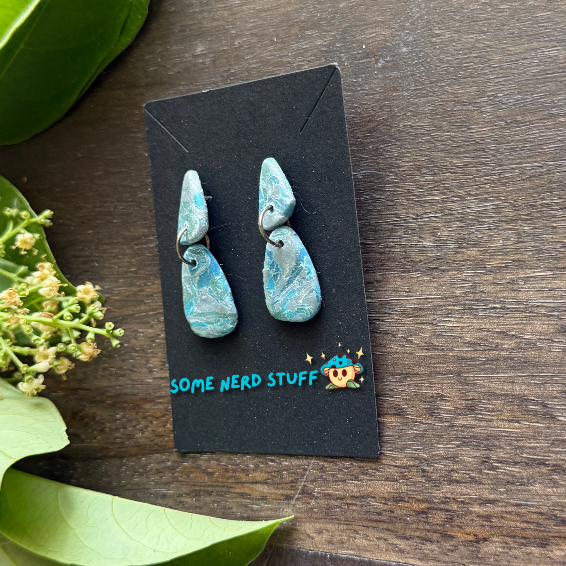 Close up of faux polymer clay faux stone earrings from SomeNerdStuff Store