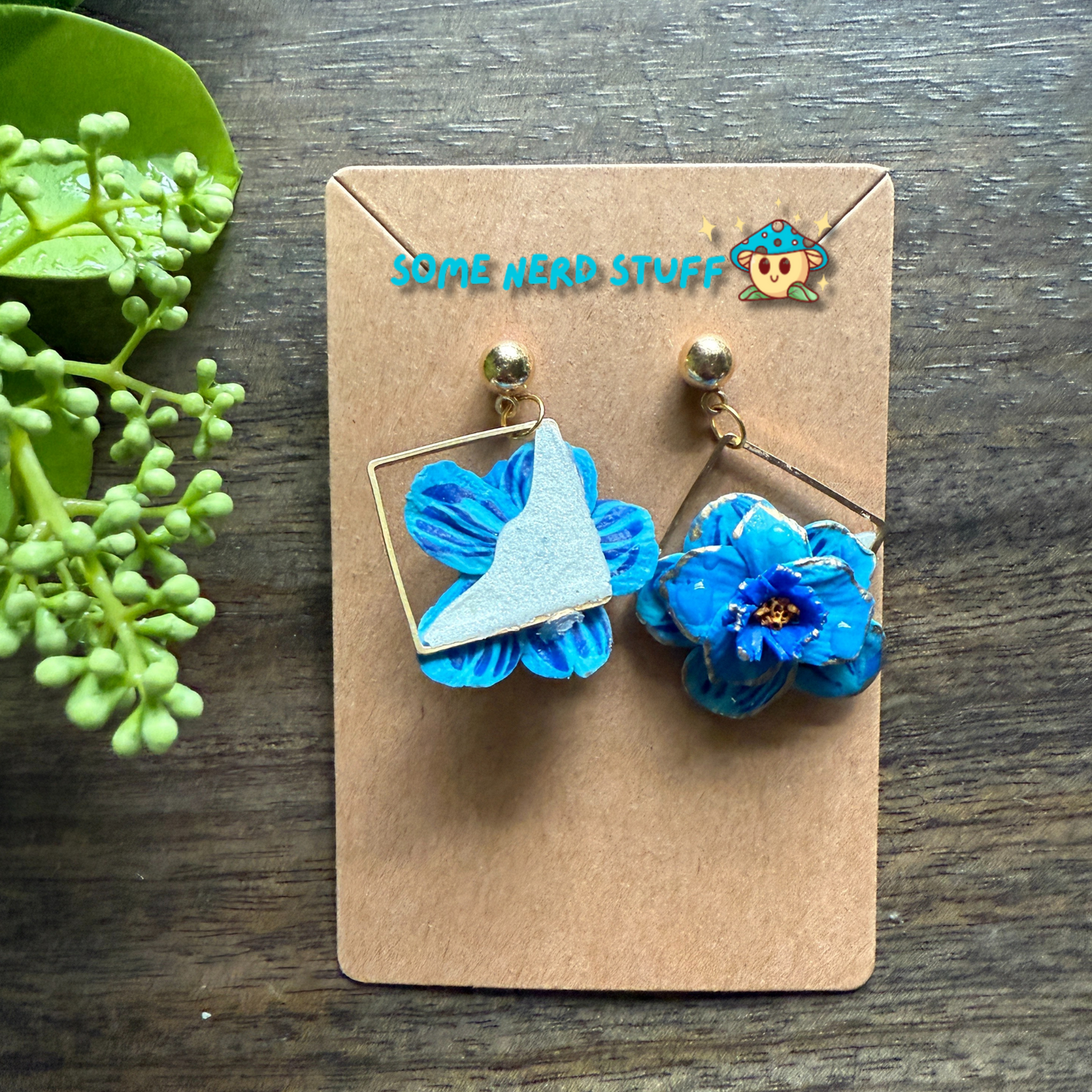 Manga Frieren: Beyond Journey's End Inspired Blue Moon Flower Polymer clay with gold highlighted earrings made by SomeNerdStuff