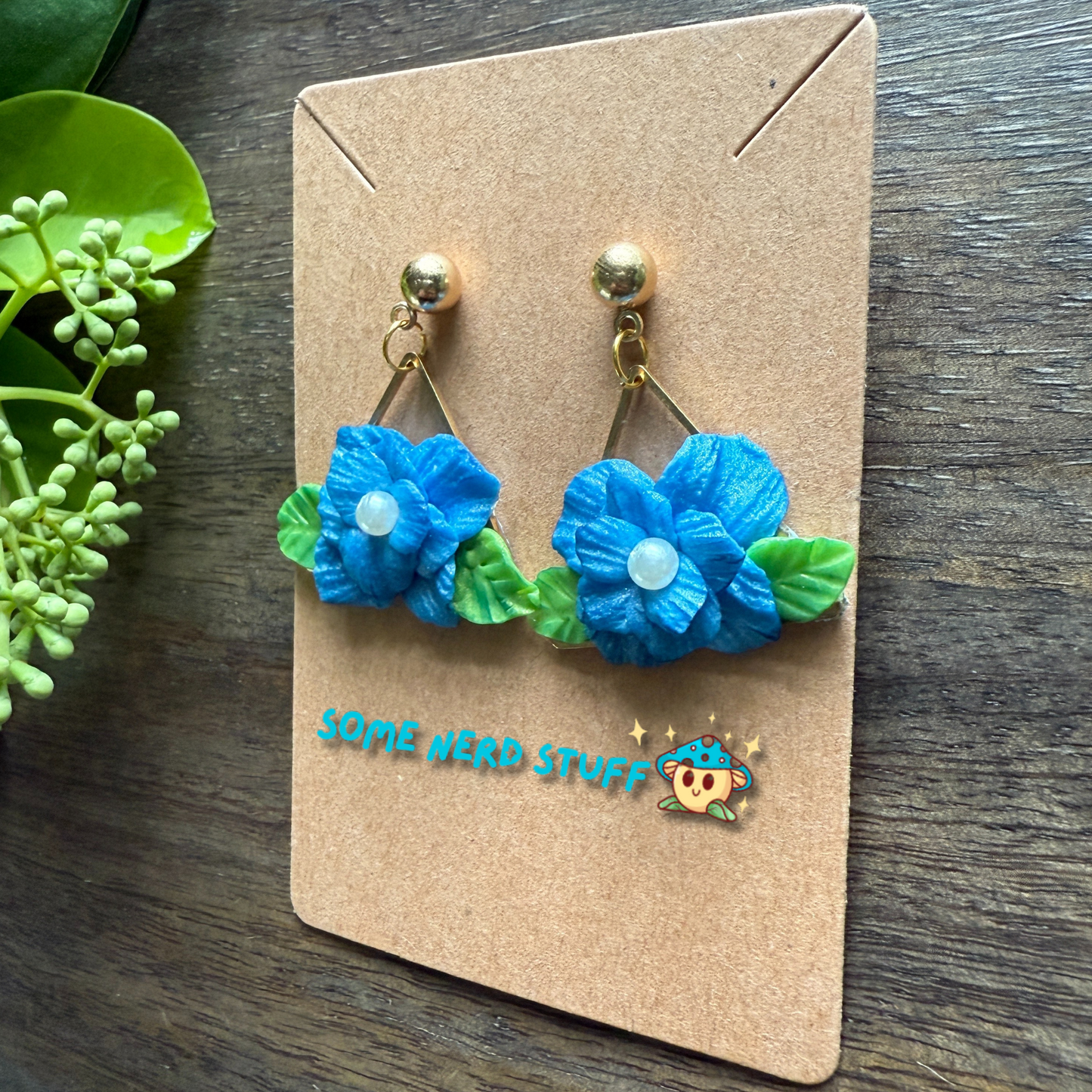 Manga Frieren: Beyond Journey's End Inspired Blue Moon Flower Polymer clay and pearl earrings made by SomeNerdStuff