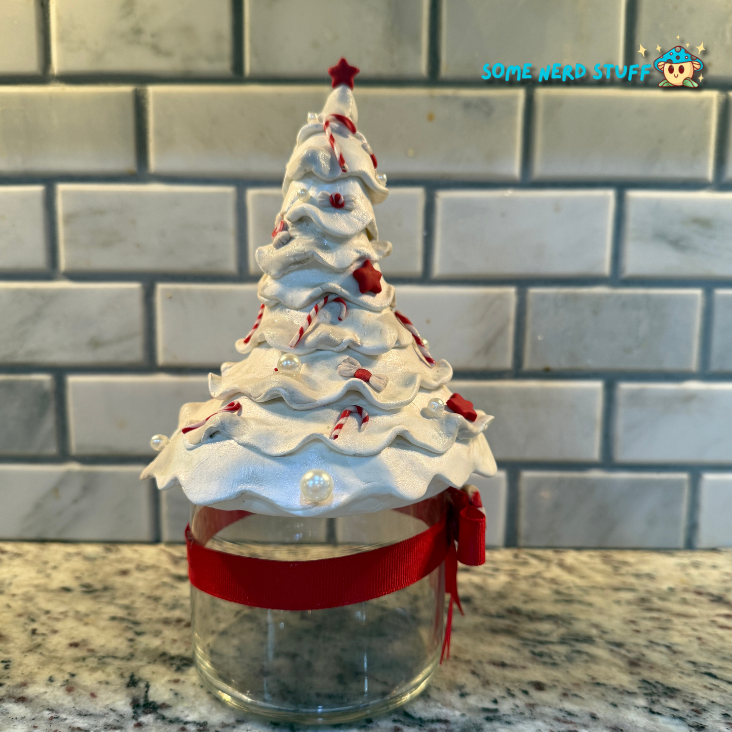 Stash Jar or Cookie Jar that is a all white Christmas tree made out of polymer clay side view made by SomeNerdStuff