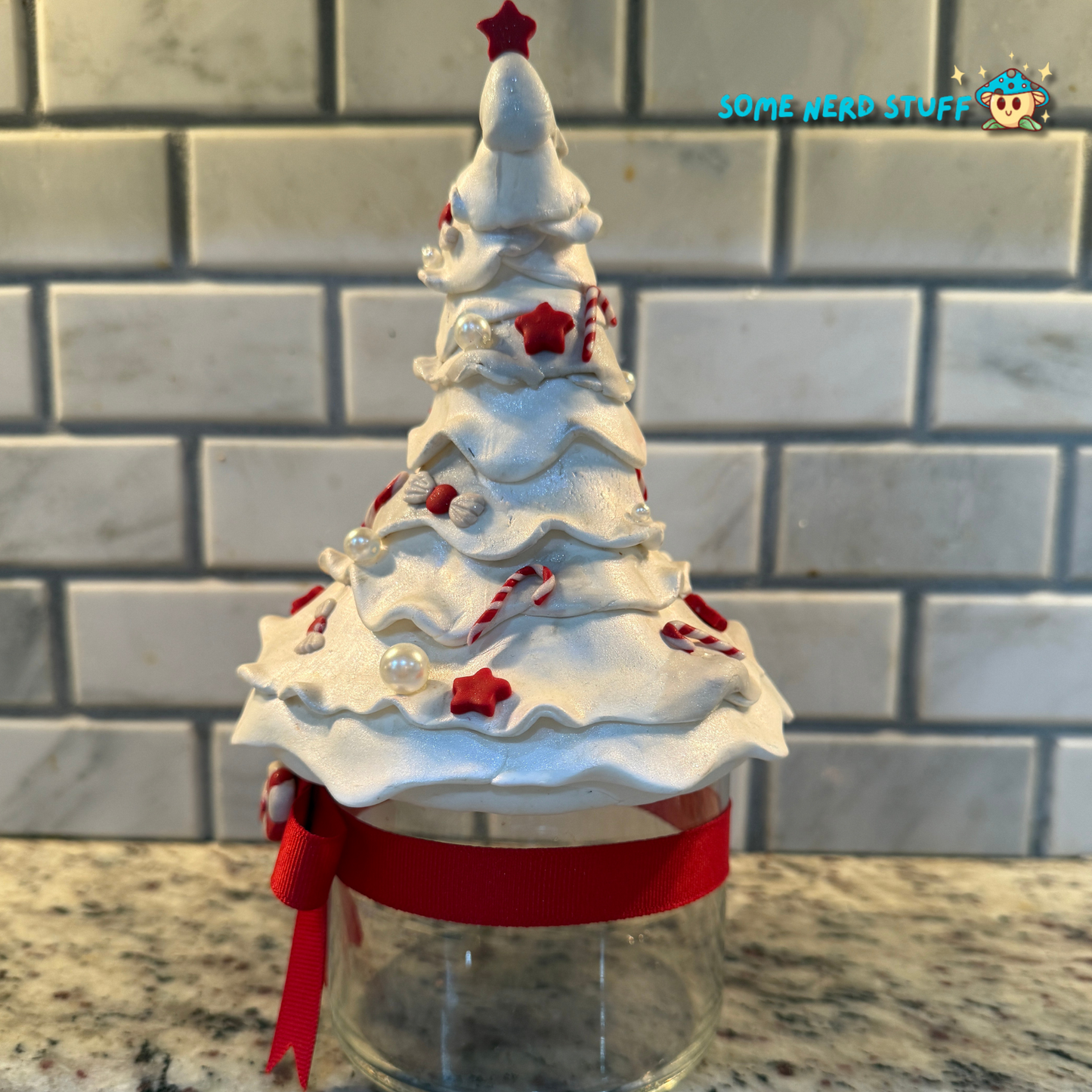 Stash Jar or Cookie Jar that is a all white Christmas tree made out of polymer clay side view made by SomeNerdStuff