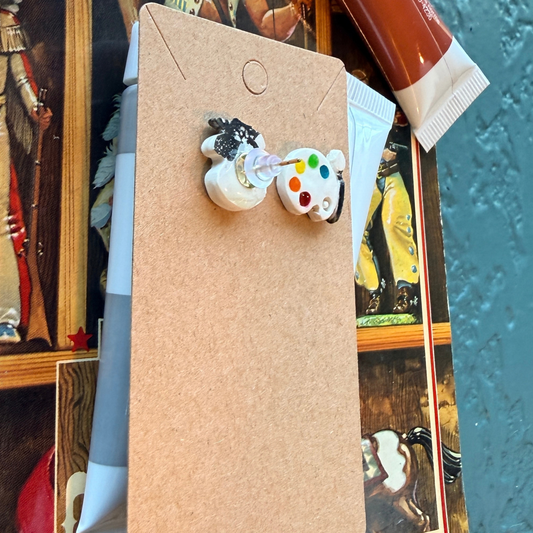 Front and back of paint palette stud earrings, showing the post and round backing.