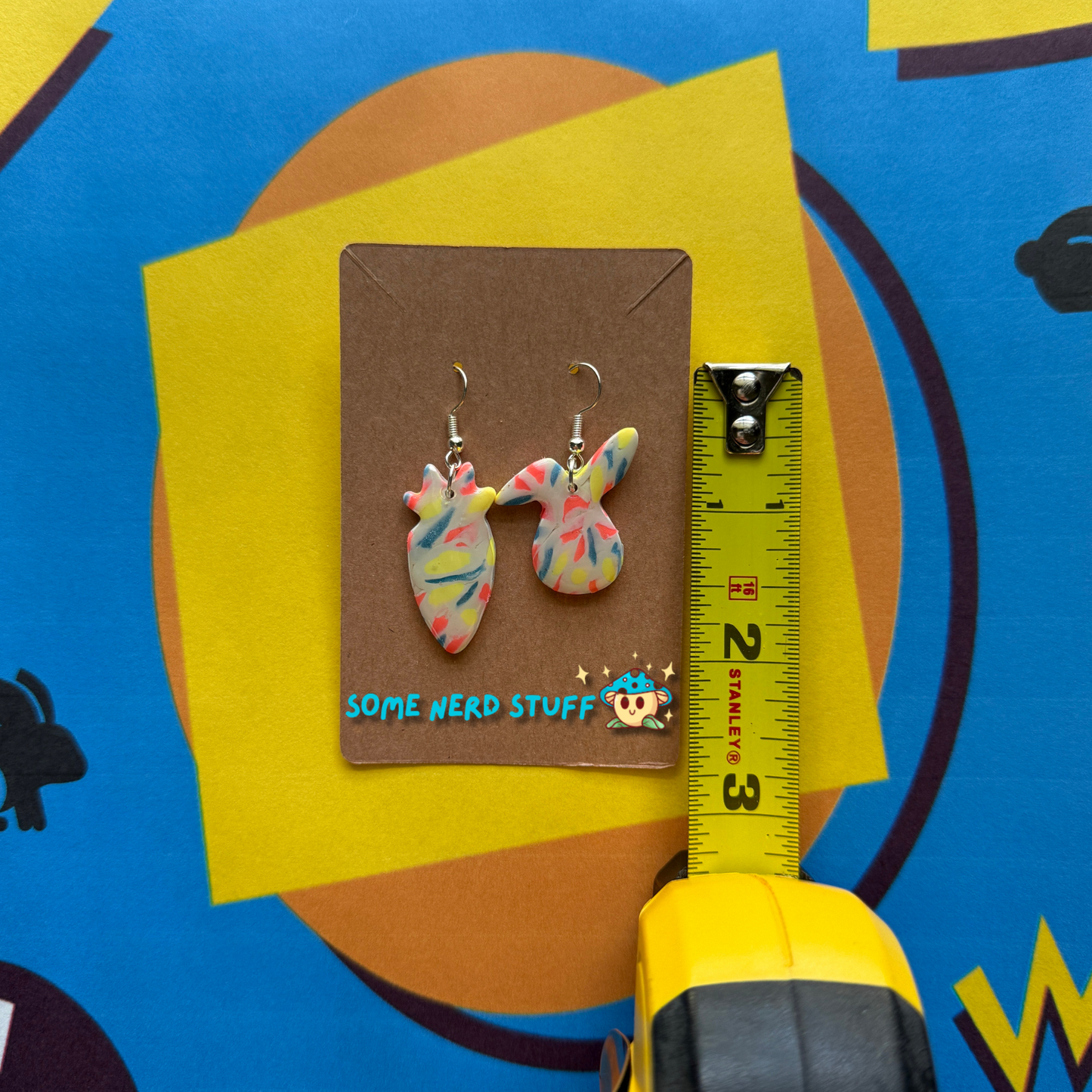 Bunny Head and Carrot Polymer Clay Earrings inspired by Saved by the Bell 90s show multicolor shown with measuring tape made by SomenerdStuff