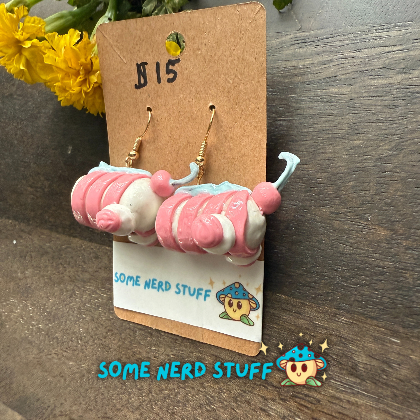 Candy peppermint swirl polymer clay earrings sold on somenerdstuff.com pink and white stripped faux candy