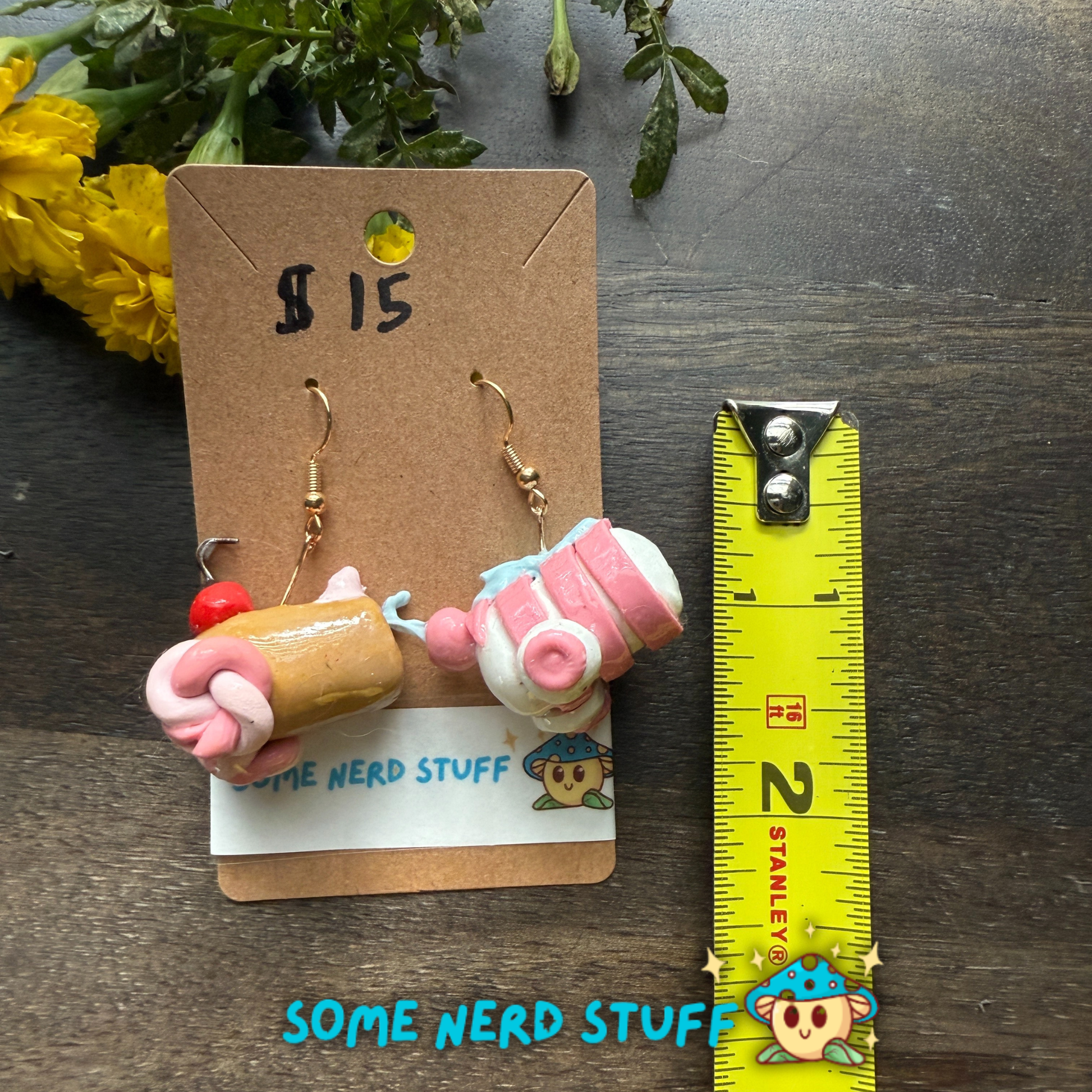 Pair of Candy Cannons Cherry topped and pepermin swirl polymer clay dangles from SomeNerdStuff around 1.5 inches tall