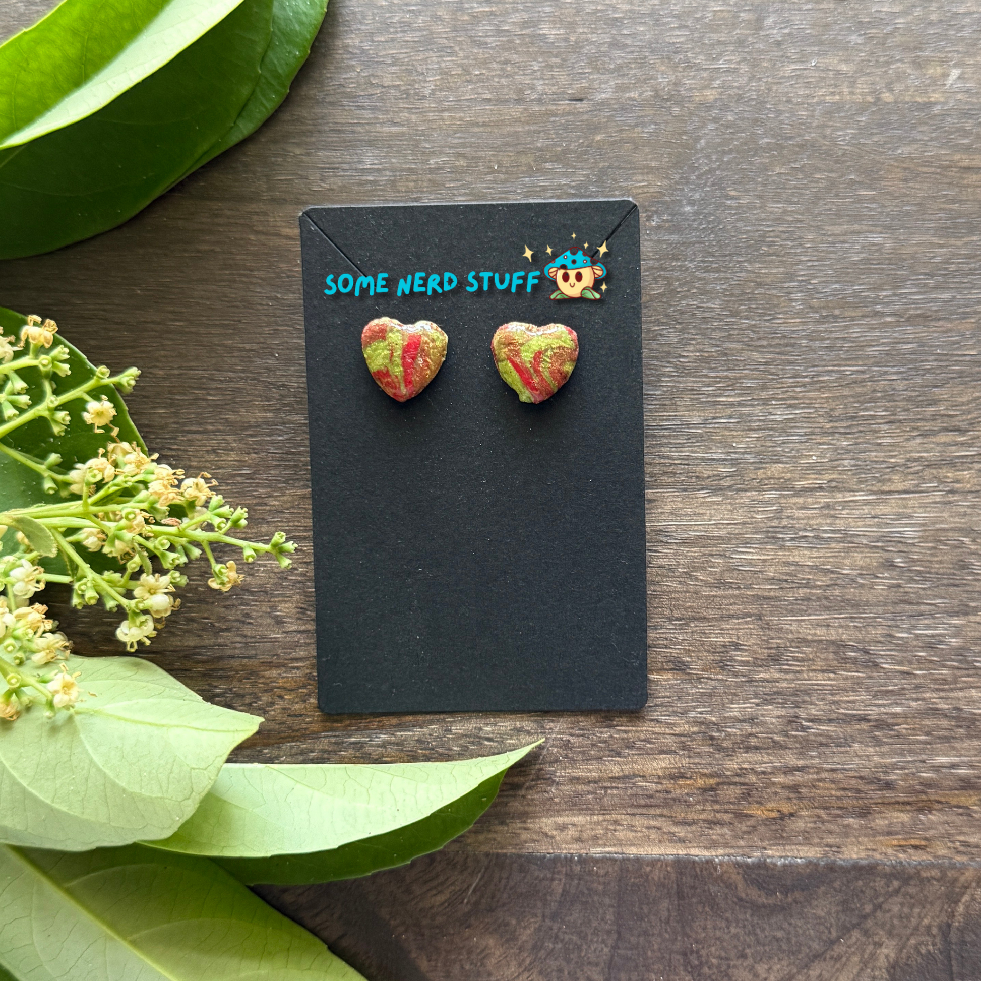 Polymer Clay swirl red and green heart earrings by SomeNerdStuff