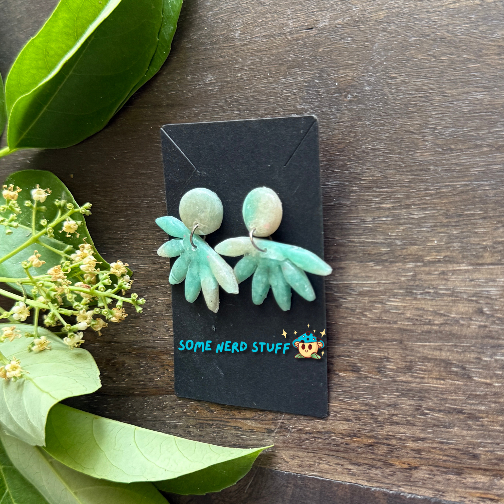 Faux polymer clay earrings with circle and horizon stone look in picture turned on its side
