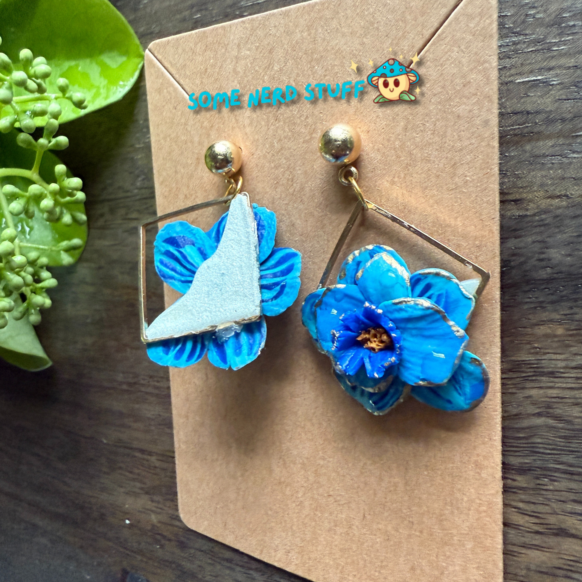 Manga Frieren: Beyond Journey's End Inspired Blue Moon Flower Polymer clay  with gold highlighted earrings made by SomeNerdStuff