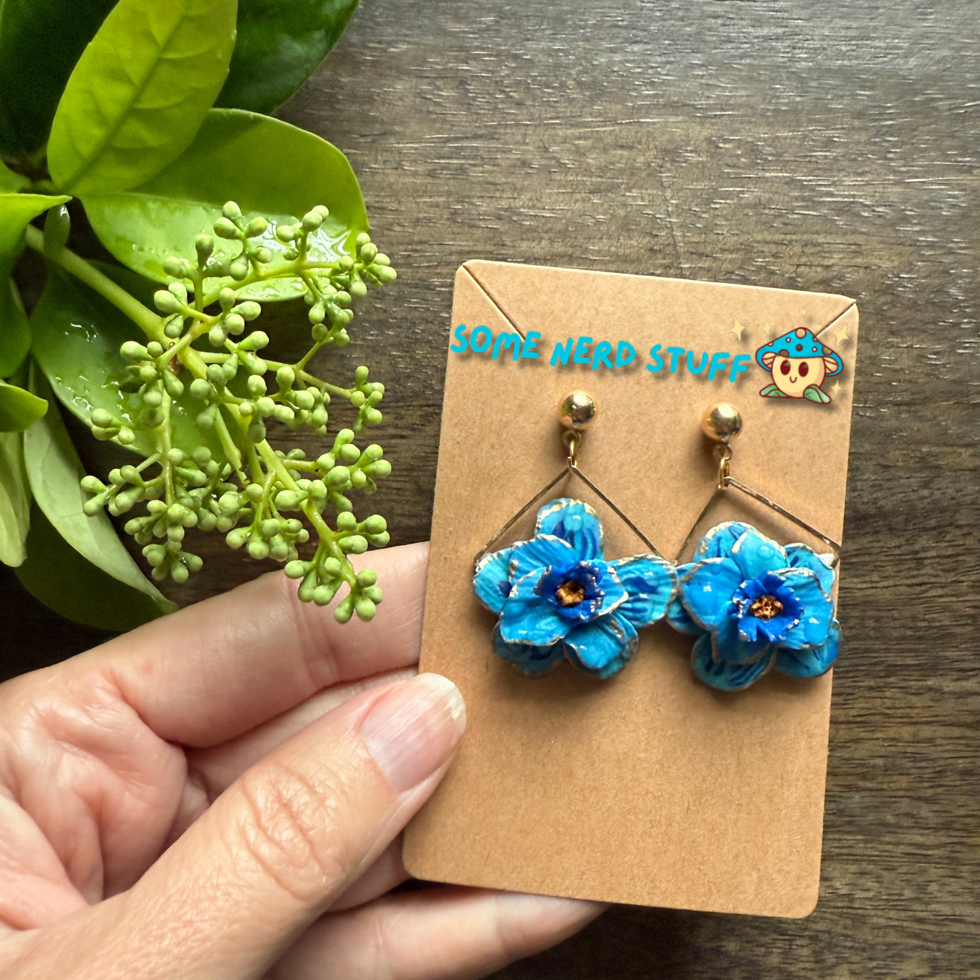 Manga Frieren: Beyond Journey's End Inspired Blue Moon Flower Polymer clay  with gold highlighted earrings made by SomeNerdStuff