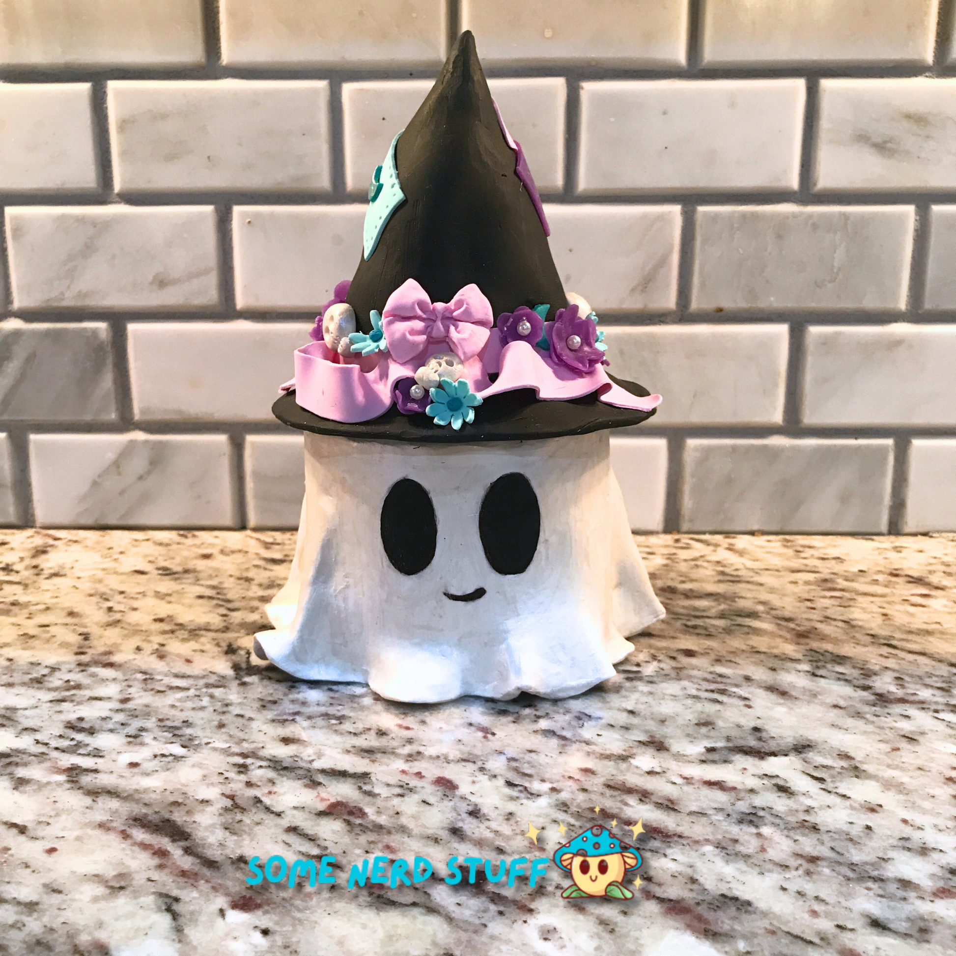 Ghost stash jar, that has a witch hat that brings to life patches, ribbon, flowers, cute skulls, and a smiling ghost