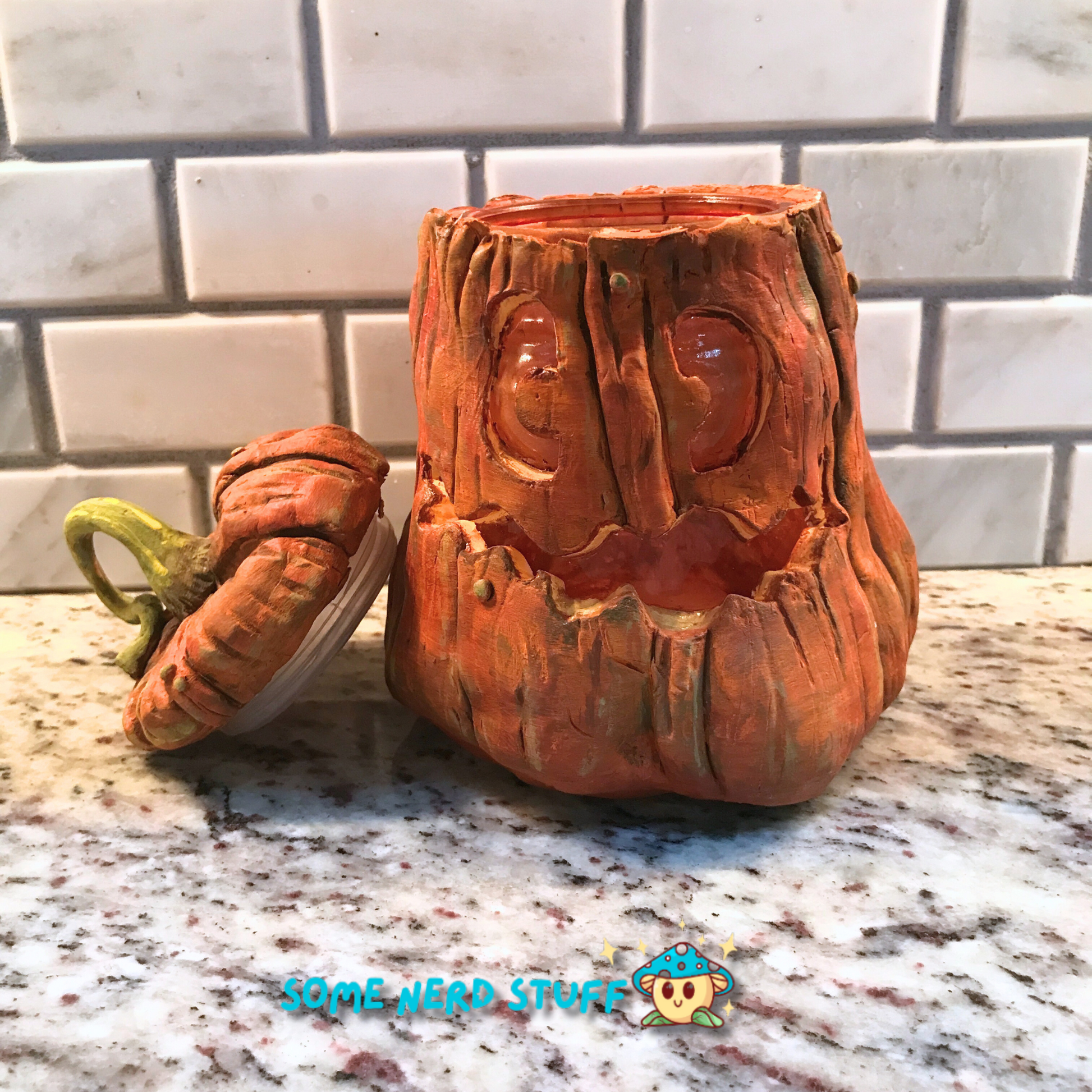 Pumpkin trinket or stash jar made out of polymer clay front view of product with top removed