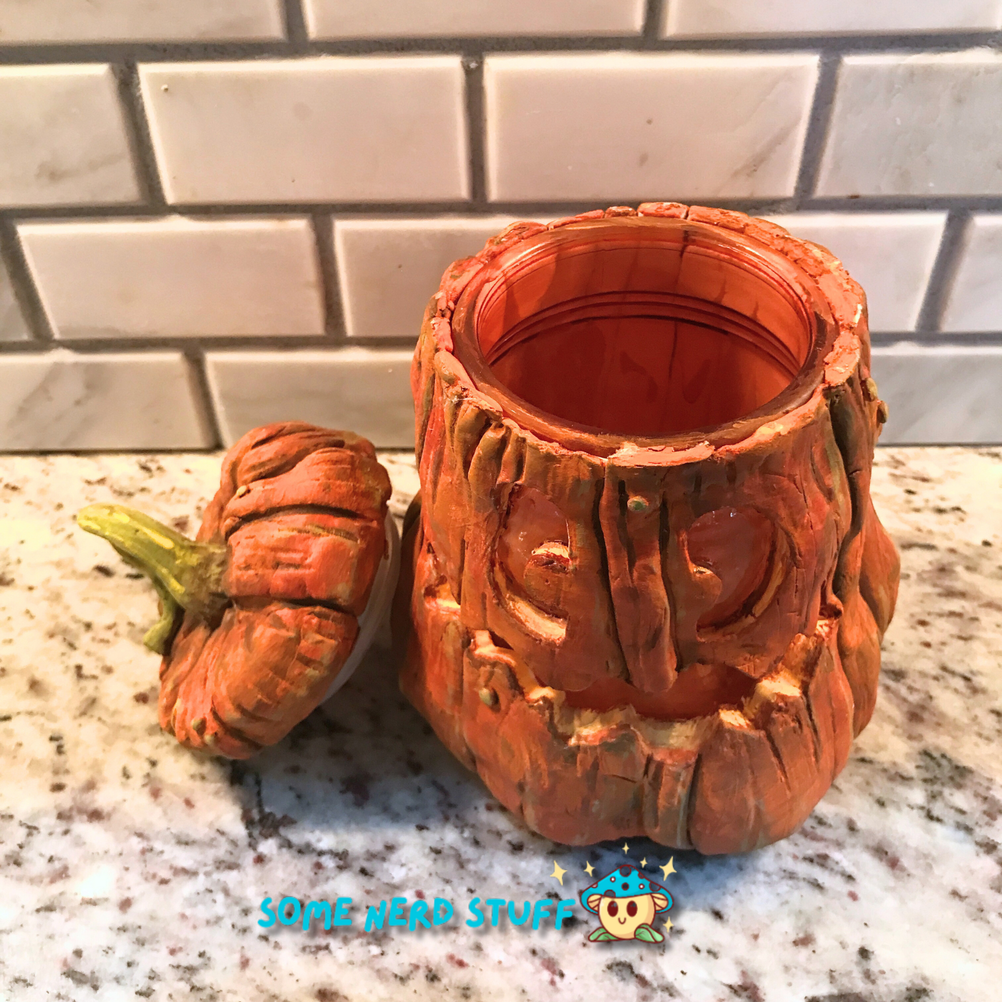 Pumpkin trinket or stash jar made out of polymer clay jar top removed to show main and top of product.