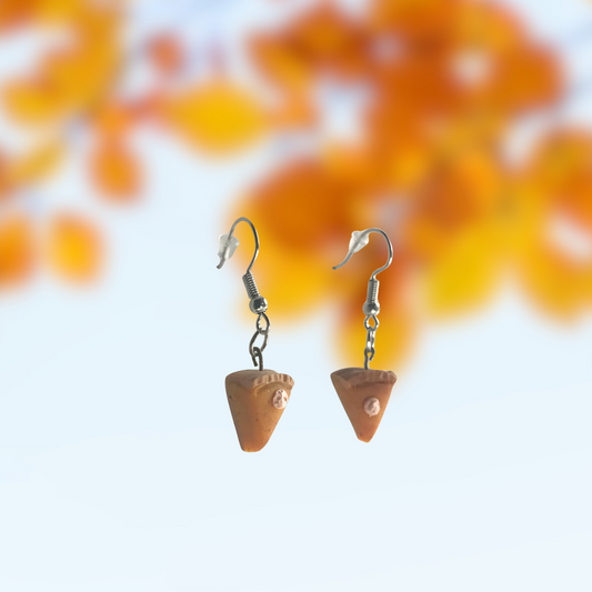 Polymer Clay Pumpkin Pie earrings with a dot of whipped cream made by SomeNerd Stuff