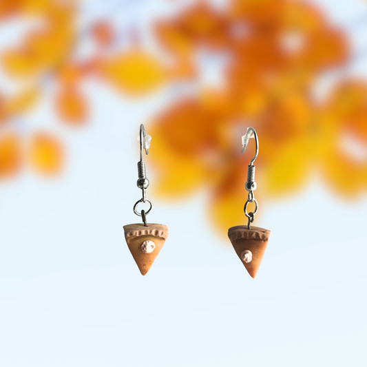 Polymer Clay Pumpkin Pie earrings with a dot of whipped cream made by SomeNerd Stuff