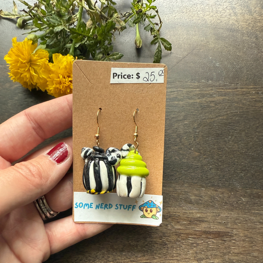 Pair of Nightmare before Christmas themed polymer clay earrings sold by SomeNerdStuff