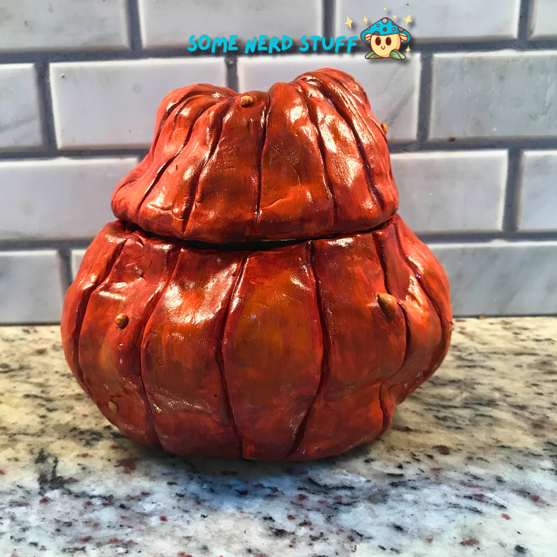 Polymer Clay pumpkin stash jar with lid and facing smiling Jolly Jack back view made by SomeNerdStuff