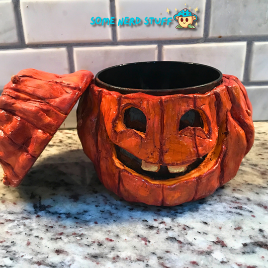 Polymer Clay pumpkin stash jar with lid and facing smiling Jolly Jack made by SomeNerdStuff