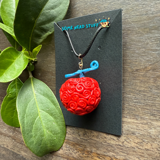 Ope Ope no Mi Necklace charm showing side video of necklace made by SomeNerdStuff