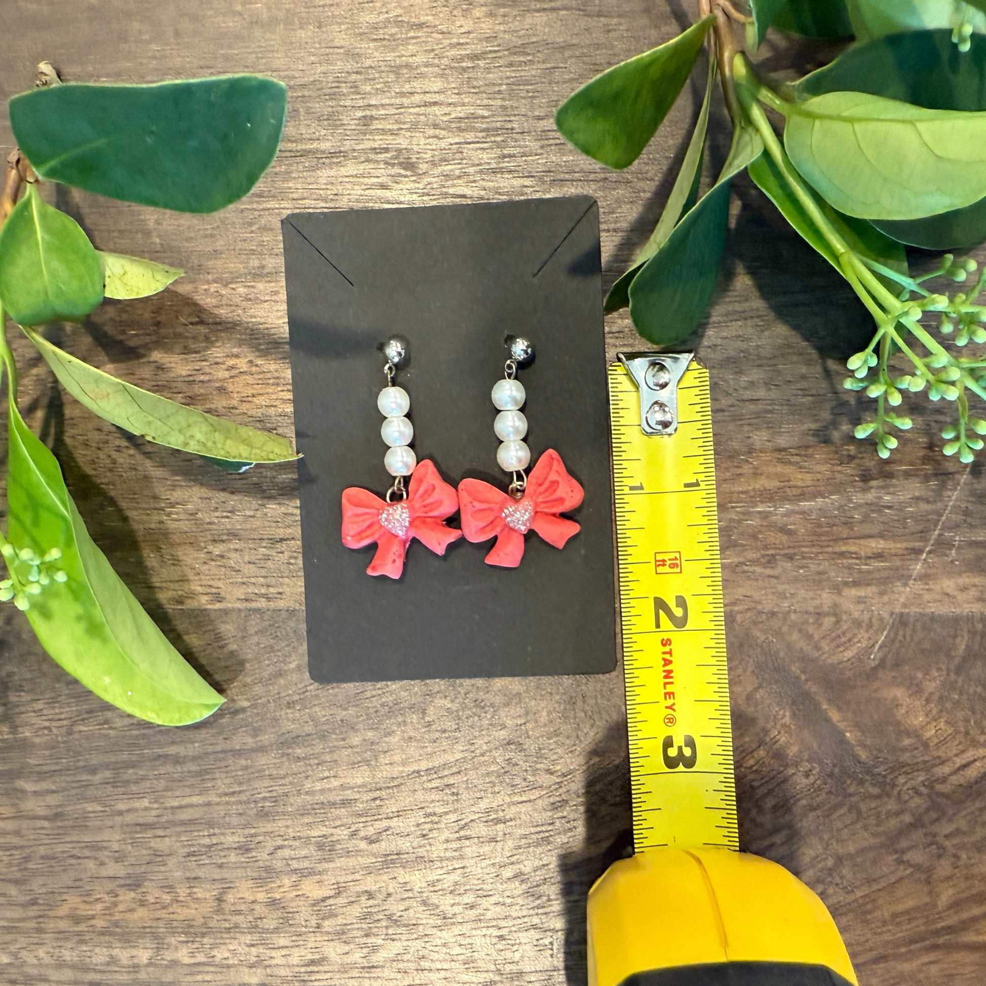 Polymer Clay pink bows with pearl danging earrings made by SomeNerdStuff