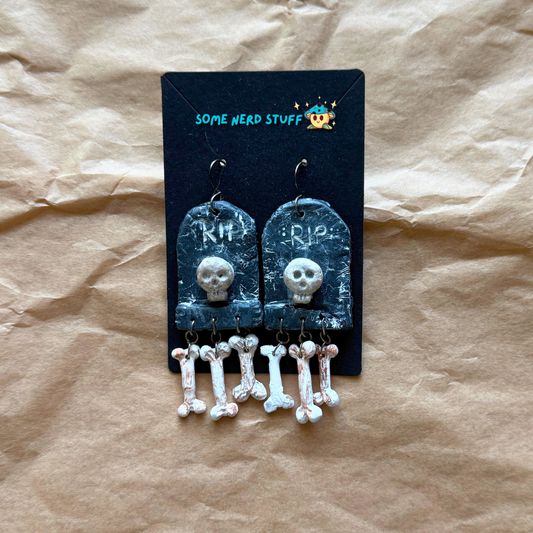 Phntom Parlor Polymer Clay tombstone skull and dangling bone earrings made by SomeNerdStuff