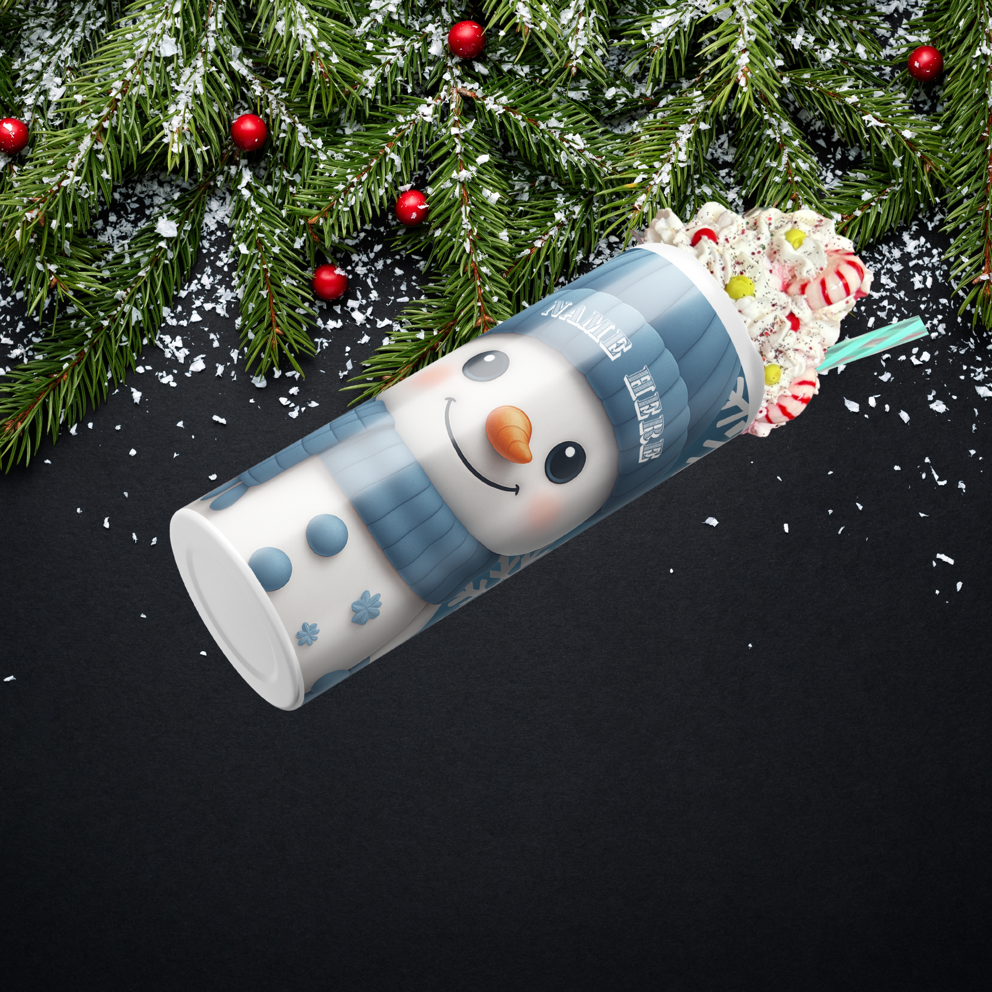 Personalized Snowman with a blue beanie and blue scarf winter tumbler, on a blue background and snowflakes sold by Some Nerd Stuff showing faux whipped topper
