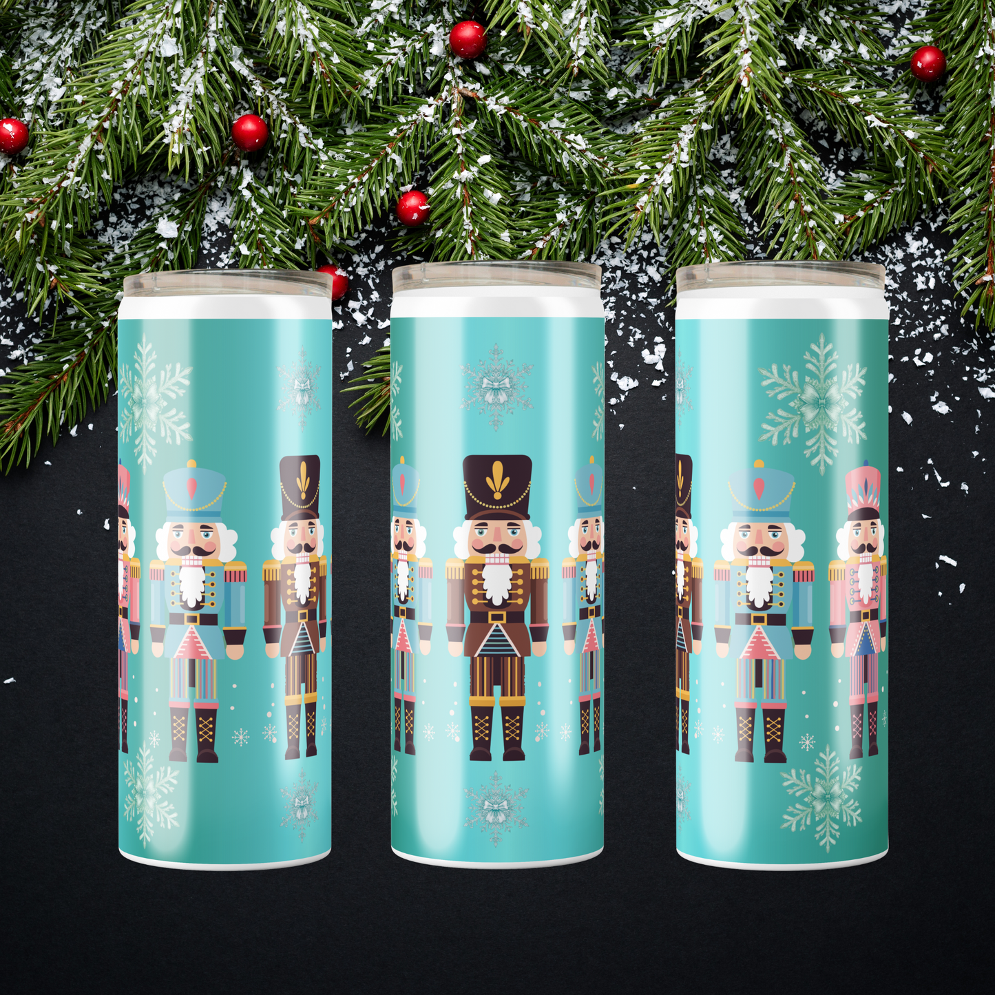 Teal Winter Tumblers made to order by hand showcasing 5 nutcracker and snowflake design by SomeNerdStuff.