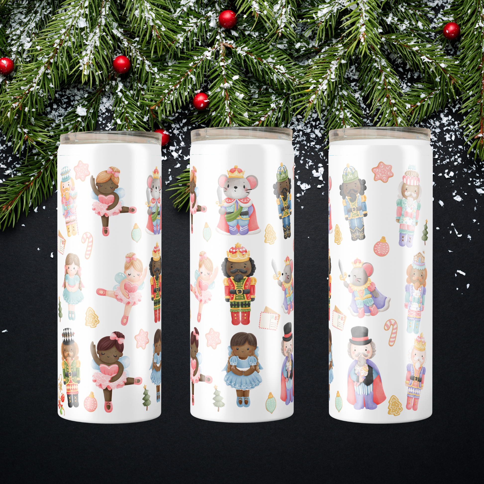Each side of One cylindrical tumbler with Nutcracker-themed illustrations against a Christmas tree background sold by SomeNerdStuff.
