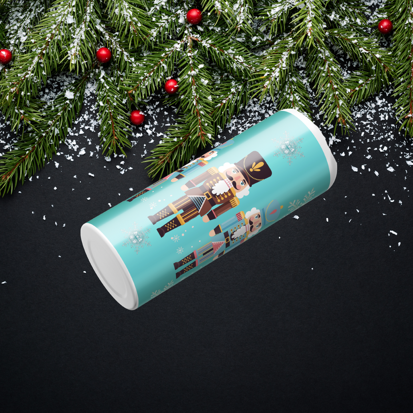 Teal Tumbler that is custom ordered showcasing 5 nutcrackers surrounded with snowflakes.