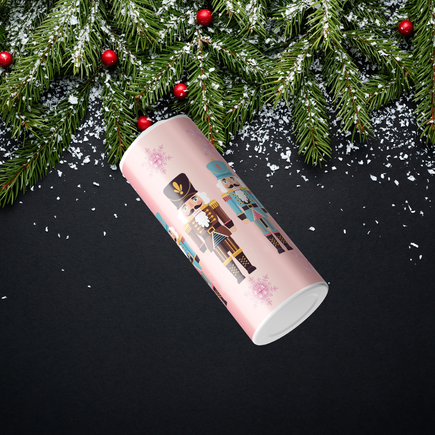 Illustrations of nutcrackers on a pink background with snowflakes  to be ordered for a custom 20oz cup from SomeNerdStuff.