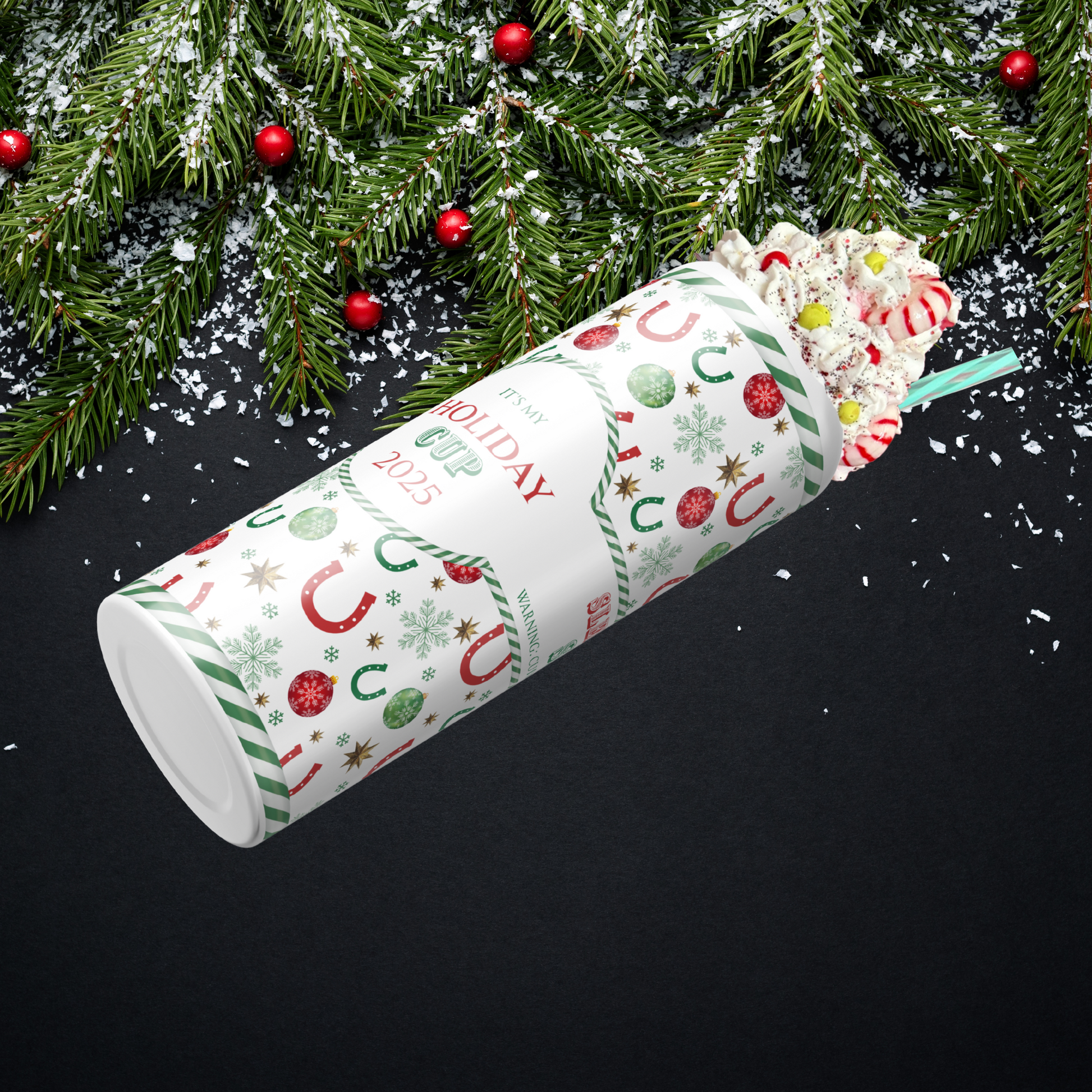 A festive holiday-themed tumbler, each side, Text on top ofh a western backroung, text, and a faux whipped cream candy topper on a black background with Christmas tree. 