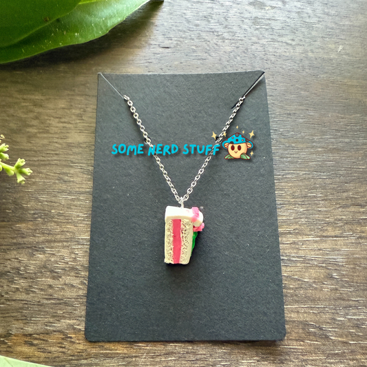 Pretty in Pink inspired Vanilla polymer clay charm and necklace with layers made by SomeNerdStuff