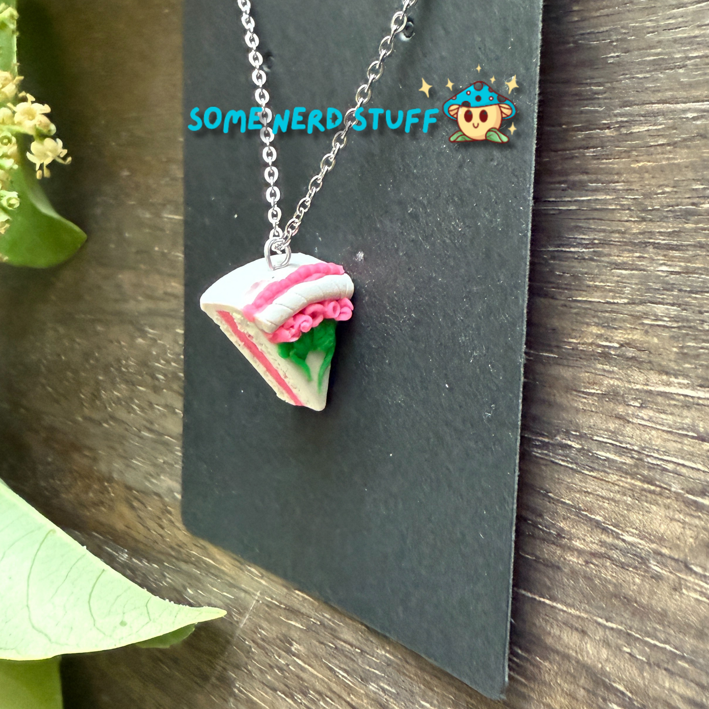 Pretty in Pink inspired Vanilla polymer clay charm and necklace with layers side view made by SomeNerdStuff