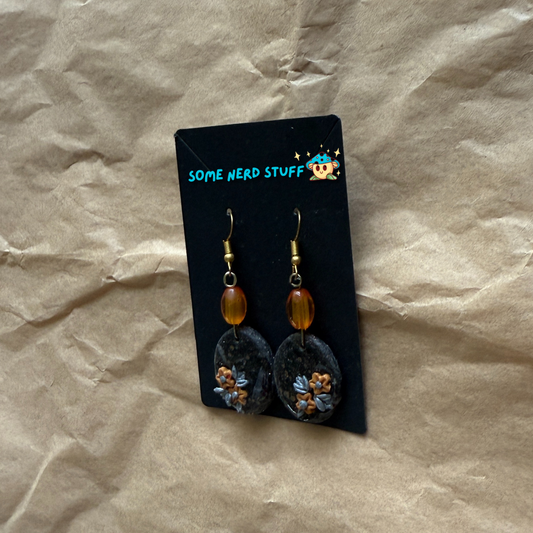 Faux Stone Polymer Clay Earrings with accent flowers and amber beads side view made by SomeNerdStuff