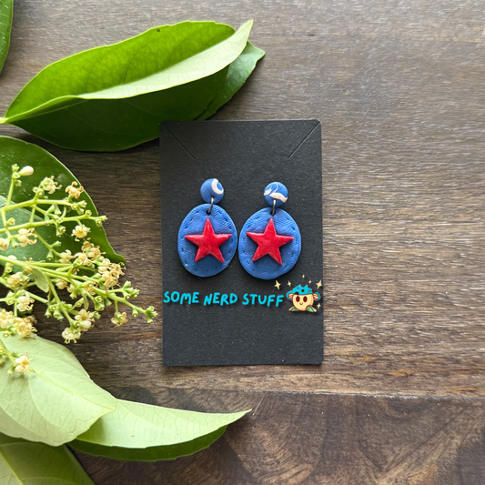 Super hero polymer clay inspired blue and red star earrings made by SomeNerdStuff