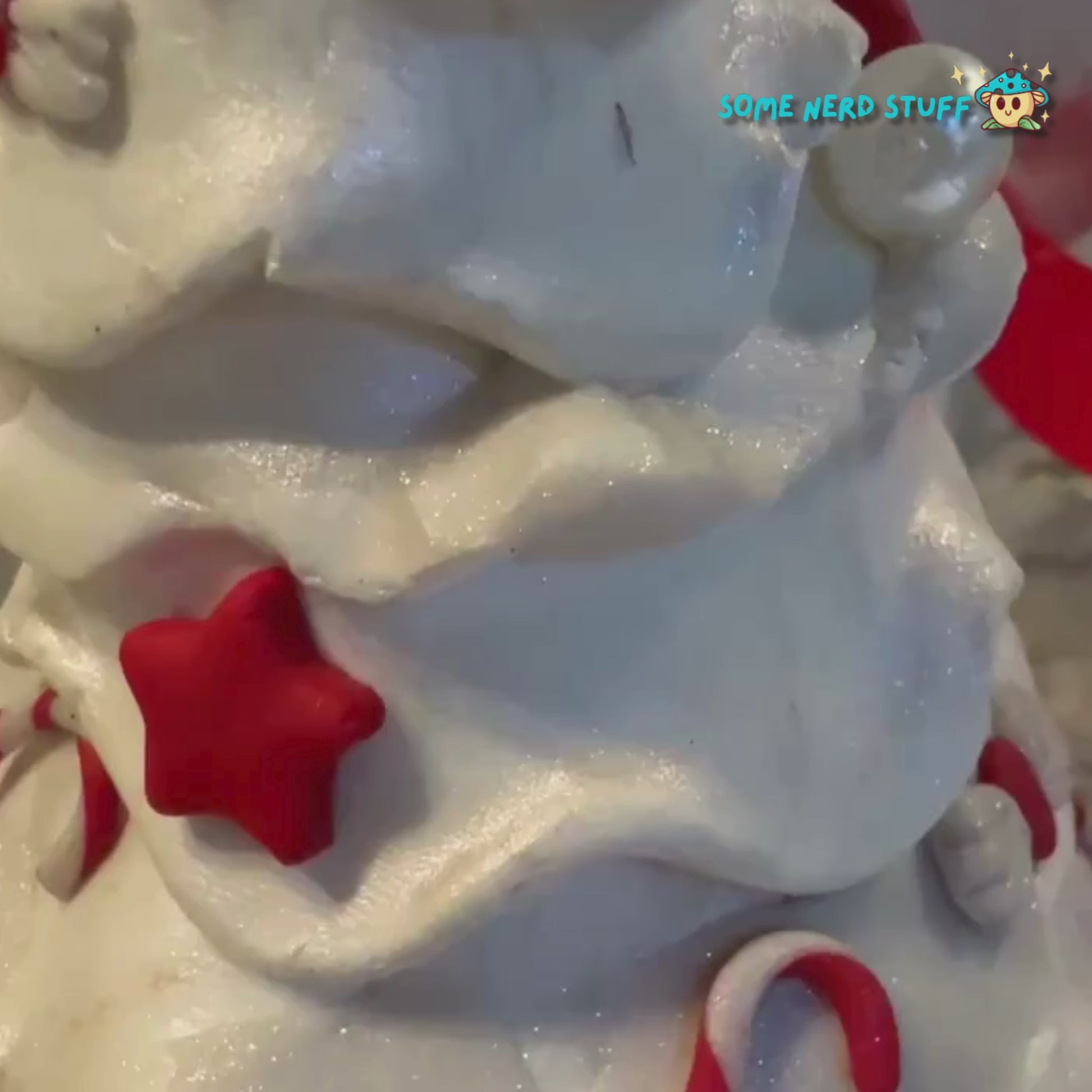 Video of Stash Jar or Cookie Jar that is a all white  Christmas tree made out of polymer clay made by SomeNerdStuff